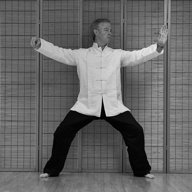 An image of Sifu Stephen Forde performing the Tai Chi posture: Single Whip